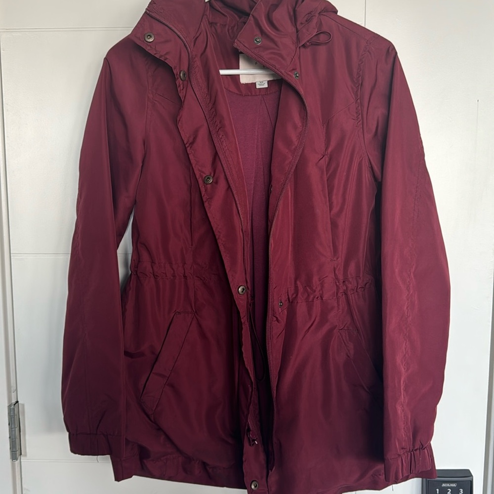 Water resistant, burgundy rain jacket